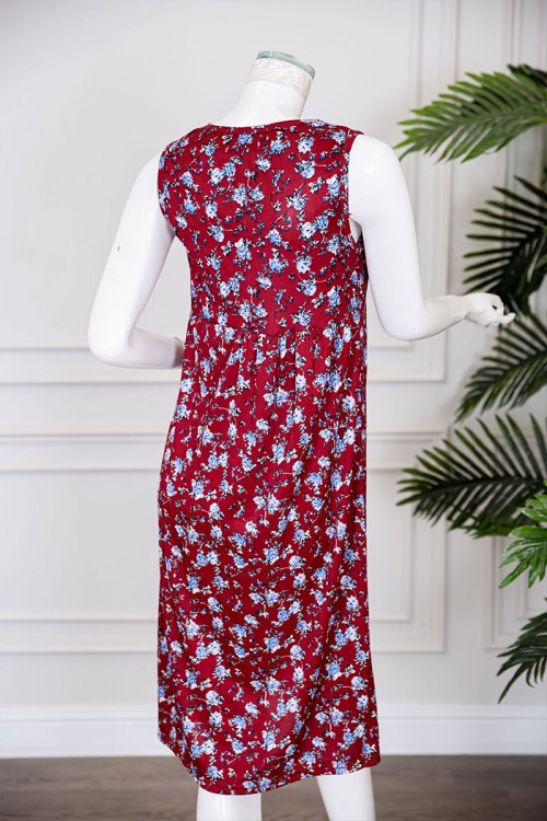 قميص نسائي قصير لون أحمر مزين برسومات ياقة دائرية و بدون أكمام