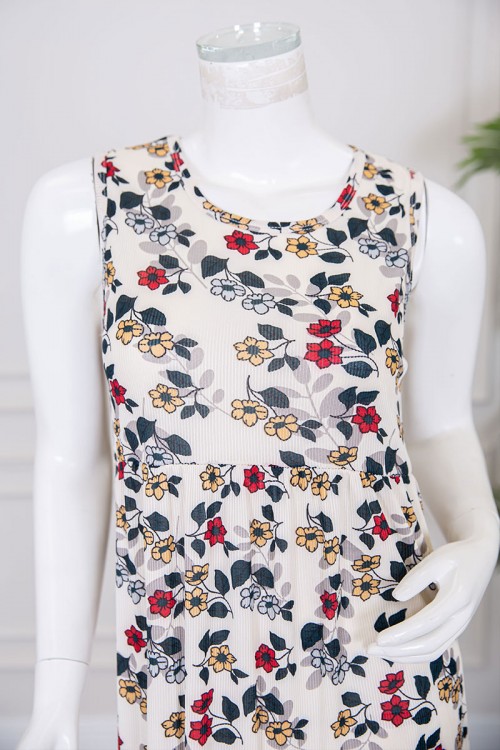 قميص نسائي قصير لون بيج مزين بالورود الملونة ياقة دائرية و بدون أكمام