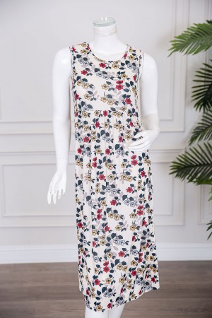 قميص نسائي قصير لون بيج مزين بالورود الملونة ياقة دائرية و بدون أكمام