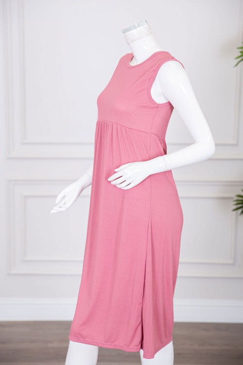 قميص نسائي قصير لون وردي بياقة دائرية و بدون أكمام