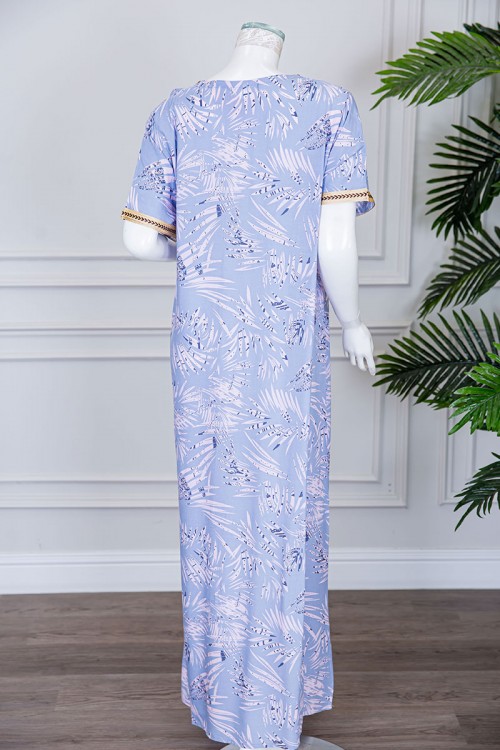 قميص نسائي طويل لون سماوي مزين بنقوش و بكلفة مطرزة في الياقة و الأكمام