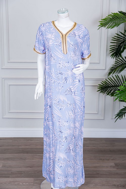 قميص نسائي طويل لون سماوي مزين بنقوش و بكلفة مطرزة في الياقة و الأكمام