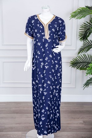 قميص نسائي طويل لون كحلي مزين برسومات و بكلفة مطرزة في الياقة و الأكمام