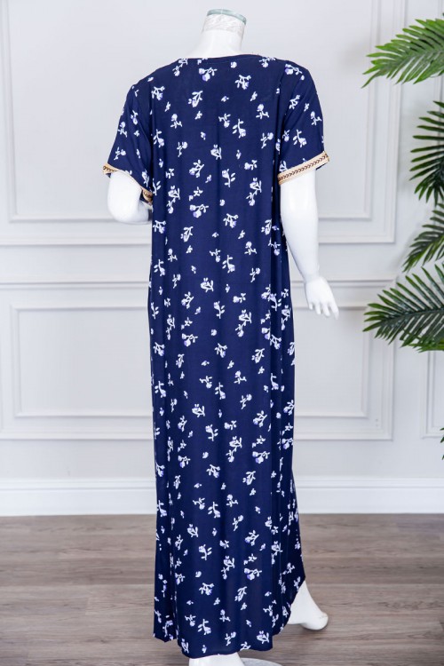 قميص نسائي طويل لون كحلي مزين برسومات و بكلفة مطرزة في الياقة و الأكمام