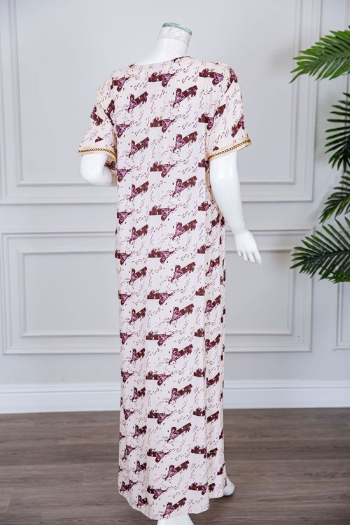 قميص نسائي طويل لون بيج فاتح مزين بنقوش و بكلفة مطرزة في الياقة و الأكمام