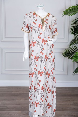 قميص نسائي طويل لون بيج فاتح مزين برسومات و بكلفة مطرزة في الياقة و الأكمام