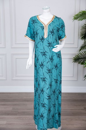 قميص نسائي طويل لون تيفاني مزين بنقوش و بكلفة مطرزة باللون الذهبي في الياقة و الأكمام