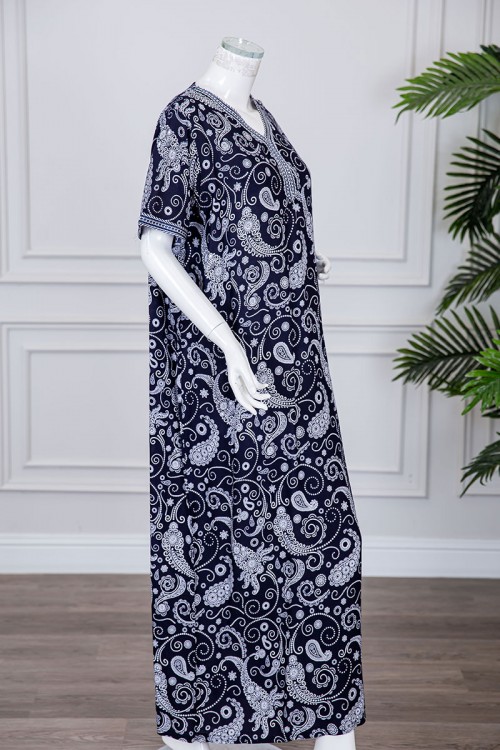 قميص نسائي طويل لون كحلي مزين برسومات و بكلفة مطرزة في الياقة و الأكمام