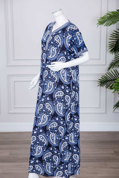 قميص نسائي طويل لون كحلي مزين برسومات و بكلفة مطرزة في الياقة و الأكمام