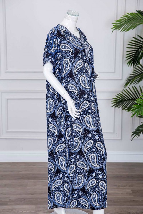 قميص نسائي طويل لون كحلي مزين برسومات و بكلفة مطرزة في الياقة و الأكمام