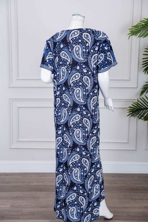 قميص نسائي طويل لون كحلي مزين برسومات و بكلفة مطرزة في الياقة و الأكمام