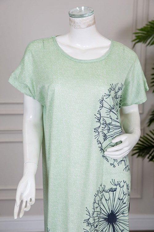 قميص نسائي طويل لون تفاحي مزين برسومات باللون الكحلي ياقة دائرية و أكمام قصيرة