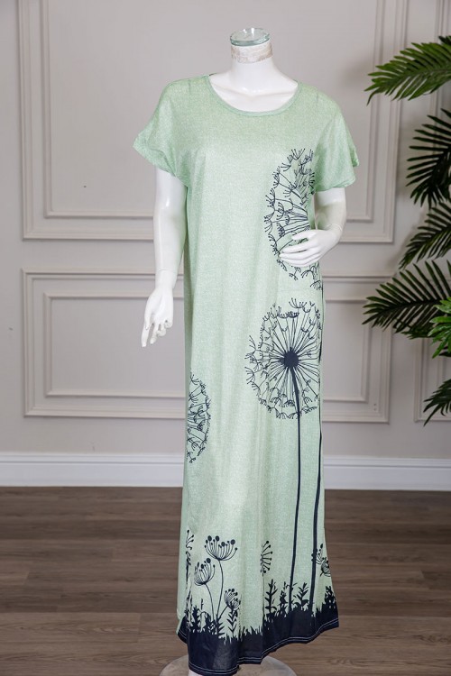 قميص نسائي طويل لون تفاحي مزين برسومات باللون الكحلي ياقة دائرية و أكمام قصيرة