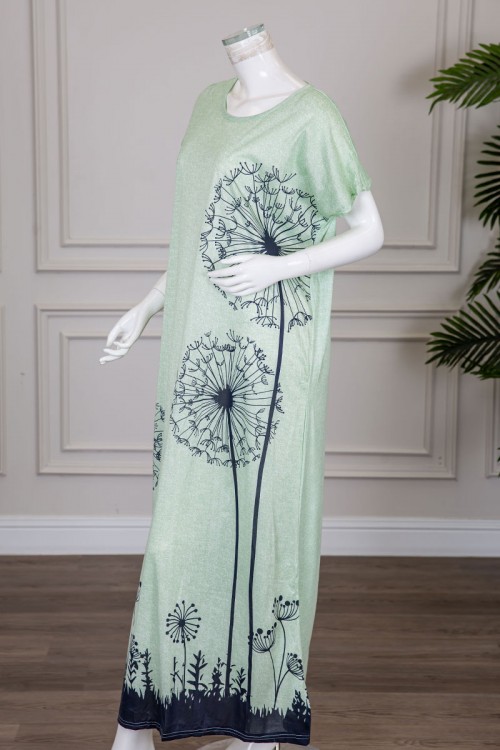 قميص نسائي طويل لون تفاحي مزين برسومات باللون الكحلي ياقة دائرية و أكمام قصيرة