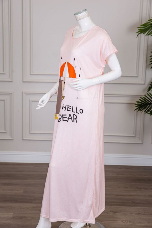 قميص نسائي طويل لون خربزي مزين برسومات بياقة دائرية و أكمام قصيرة