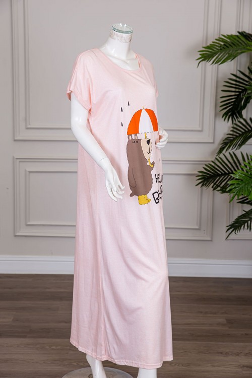 قميص نسائي طويل لون خربزي مزين برسومات بياقة دائرية و أكمام قصيرة