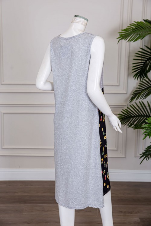 قميص نسائي قصير لون رمادي و أسود مزين بكتابات و رسومات ياقة دائرية بدون أكمام