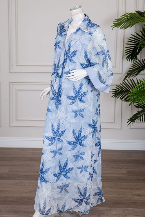 جلابية نسائية لون سماوي مشجرة ياقة قصة سبعة مطوية مزينة بكريستال و بأكمام طويلة