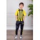 طقم ولادي رياضي قطعتين تيشيرت لون أصفر مقلم باللون الأسود و بنطلون طويل لون أسود مخطط باللون الأصفر من الجانبين و بزم من الأسفل