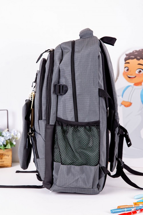 شنطة ظهر مدرسية ولادي متعددة الألوان بجيوب متعددة مع مقلمة