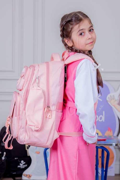 شنطة ظهر مدرسية متعددة الألوان بجيوب متعددة مع مقلمة