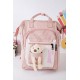 شنطة ظهر مدرسية بناتي لون وردي فاتح بجيوب متعددة و بدبدوب من الأمام