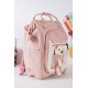 شنطة ظهر مدرسية بناتي لون وردي فاتح بجيوب متعددة و بدبدوب من الأمام