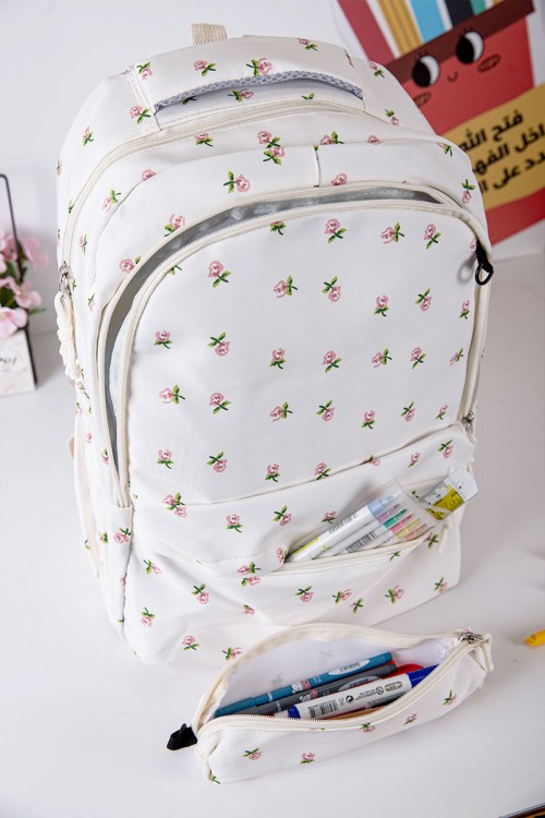 شنطة ظهر مدرسية بناتي لون بيج فاتح مزينة بورود و بجيوب متعددة مع مقلمة