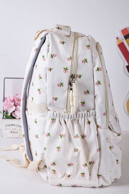 شنطة ظهر مدرسية بناتي لون بيج فاتح مزينة بورود و بجيوب متعددة مع مقلمة