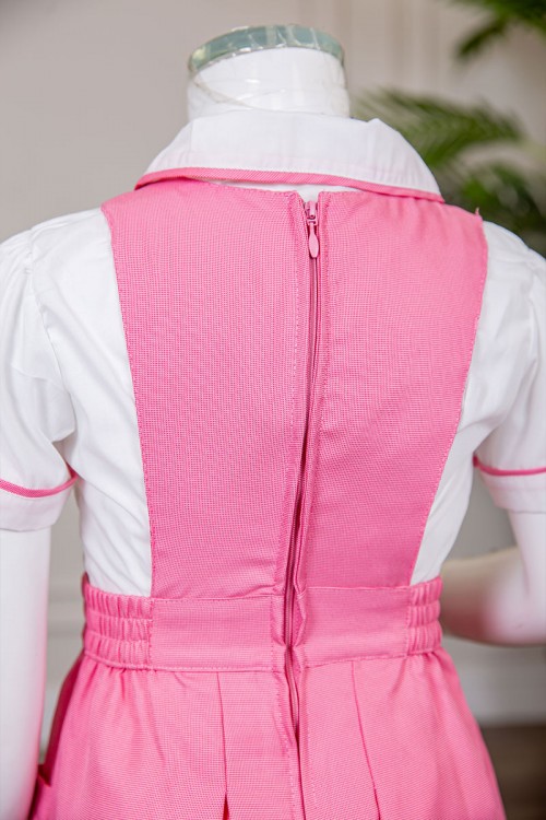 مريول مدرسي بناتي قطعتين لون وردي ياقة قصة سبعة بخصر مزموم