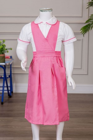 مريول مدرسي بناتي قطعتين لون وردي ياقة قصة سبعة بخصر مزموم 