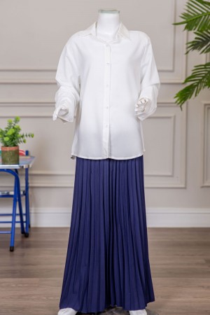 مريول بناتي مدرسي مرحلة الثانوي قطعتين قميص أبيض بياقة مطوية و بأزرار من الأمام و الأكمام و تنورة لون كحلي بكسرات و خصر مزموم 