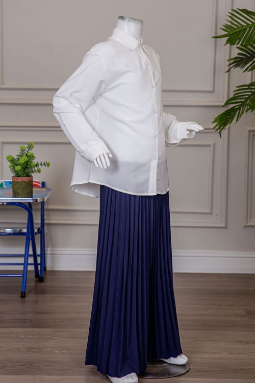 مريول بناتي مدرسي مرحلة الثانوي قطعتين قميص أبيض بياقة مطوية و بأزرار من الأمام و الأكمام و تنورة لون كحلي بكسرات و خصر مزموم