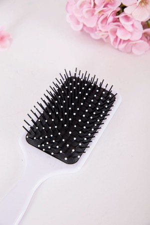 فرشاة شعر لون سماوي مزينة بكتابات و رسومات ملونة