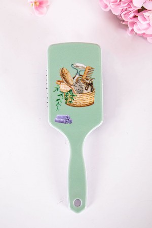 فرشاة شعر لون أخضر مزينة برسومات ملونة