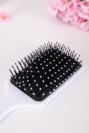 فرشاة شعر لون وردي مزينة برسومات و كتابات ملونة