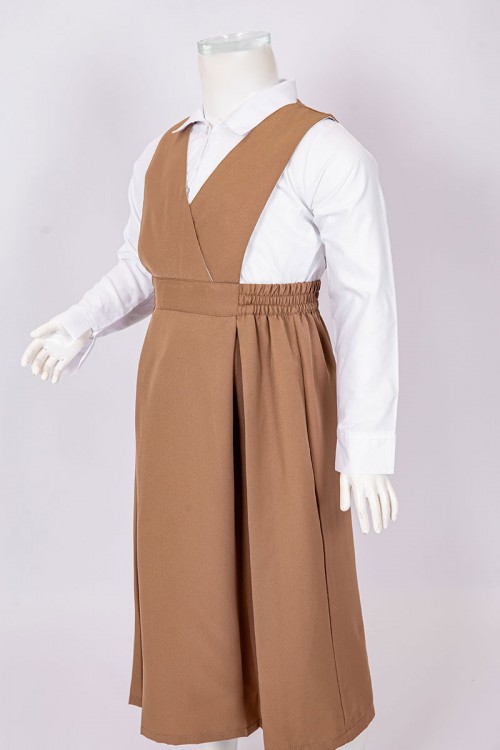 مريول مدرسي بناتي روضة لون بيج ياقة قصة سبعة بزم في الخصر و جيب من اليمين مع قميص أبيض ياقة مطوية  بأزرار من الأمام و بأكمام طويلة