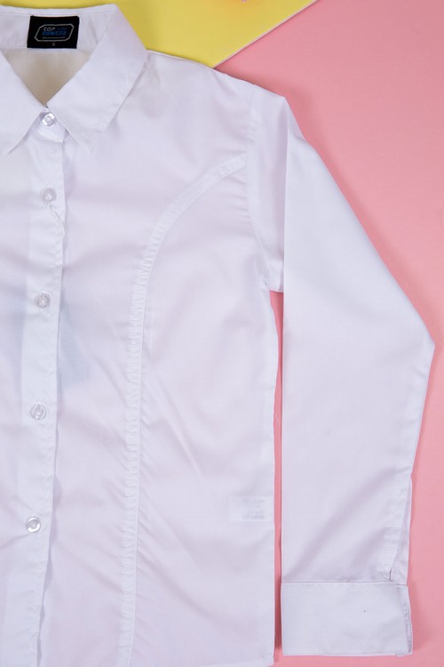 قميص مدرسي لون أبيض بياقة مطوية و بأزرار من الأمام و الأكمام