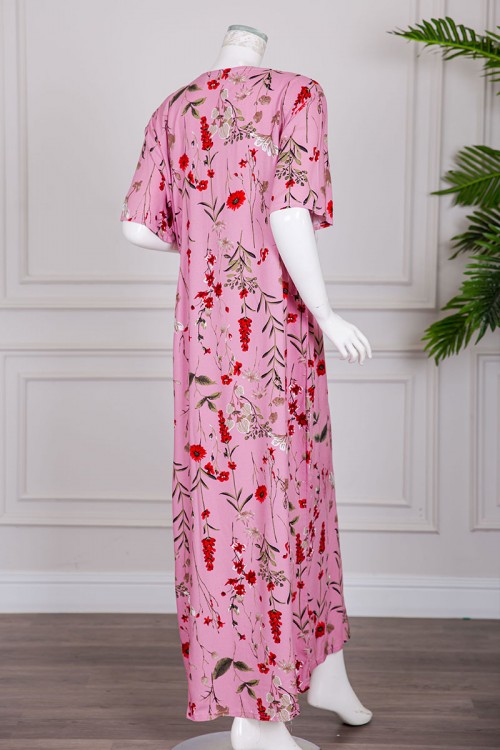 قميص نسائي طويل لون وردي مشجر بياقة دائرية بأزرار من الأمام ذو أكمام قصيرة