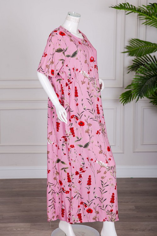 قميص نسائي طويل لون وردي مشجر بياقة دائرية بأزرار من الأمام ذو أكمام قصيرة