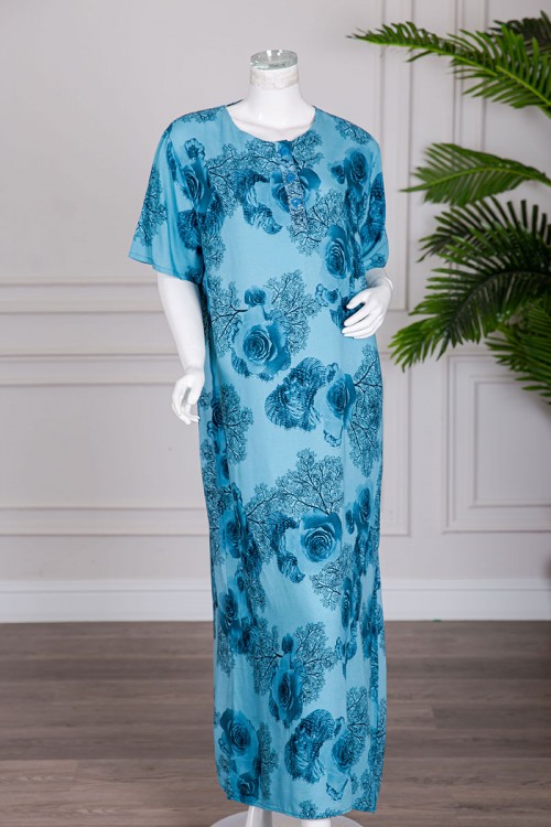 قميص نسائي طويل لون سماوي مشجر بياقة دائرية و بأزرار من الأمام و أكمام قصيرة