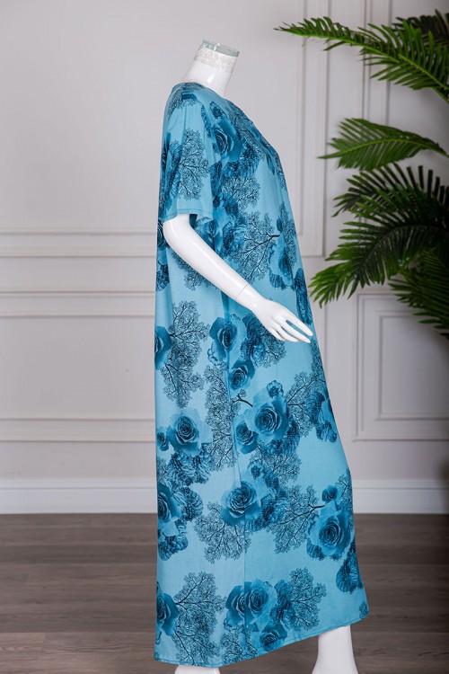 قميص نسائي طويل لون سماوي مشجر بياقة دائرية و بأزرار من الأمام و أكمام قصيرة