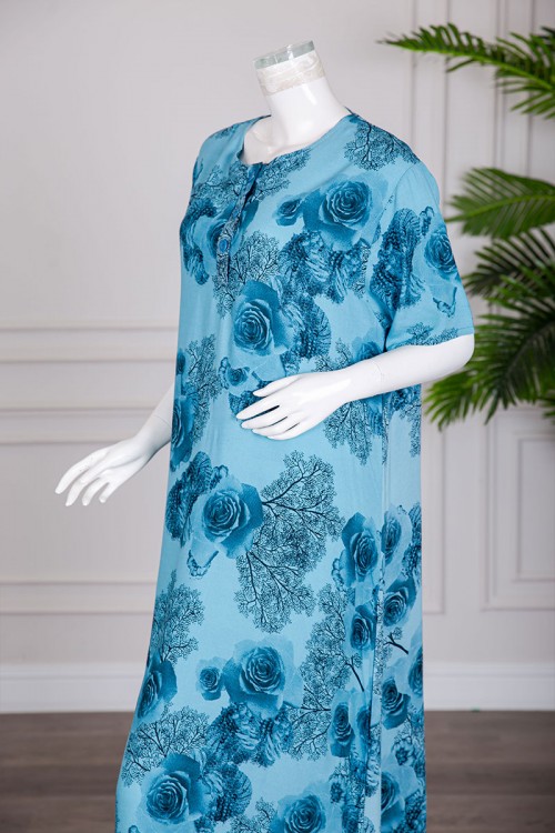 قميص نسائي طويل لون سماوي مشجر بياقة دائرية و بأزرار من الأمام و أكمام قصيرة