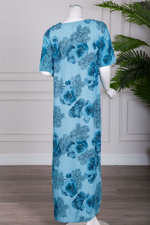 قميص نسائي طويل لون سماوي مشجر بياقة دائرية و بأزرار من الأمام و أكمام قصيرة