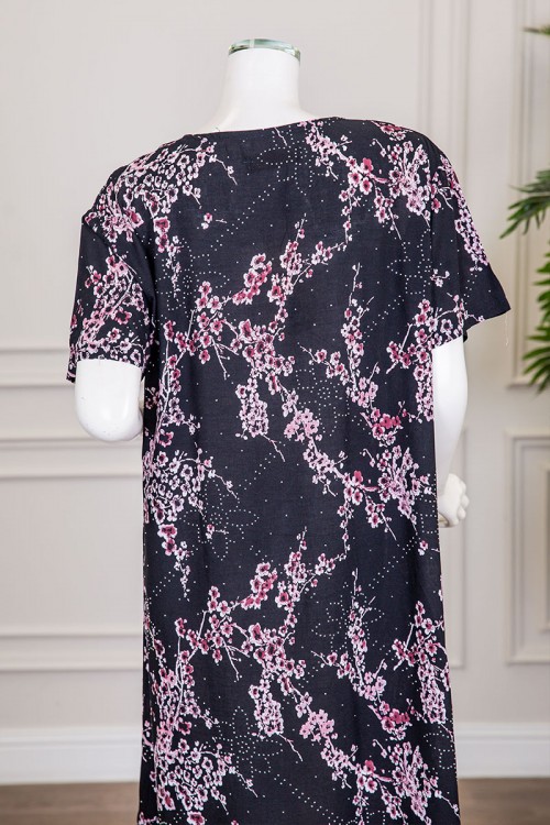 قميص نسائي ميدي لون أسود مشجر مزين بفصوص ياقة قصة سبعة و أكمام قصيرة