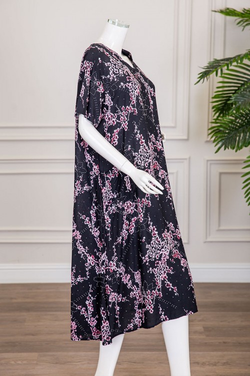 قميص نسائي ميدي لون أسود مشجر مزين بفصوص ياقة قصة سبعة و أكمام قصيرة