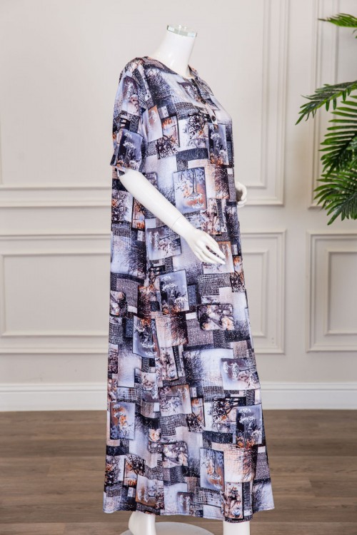 قميص نسائي طويل مزين برسومات و أشكال ملونة بفصوص ياقة دائرية بأزرار من الأمام و أكمام قصيرة