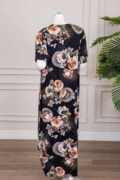 قميص نسائي طويل لون أسود مشجر مزين بفصوص ياقة دائرية بأزرار من الأمام و أكمام قصيرة