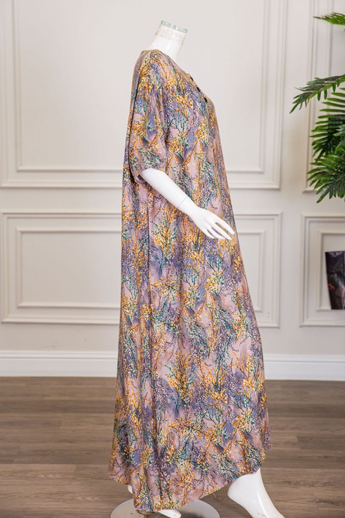 قميص نسائي جامبو طويل مشجر بتموجات لونية ياقة دائرية بأزرار من الأمام و أكمام ميدي