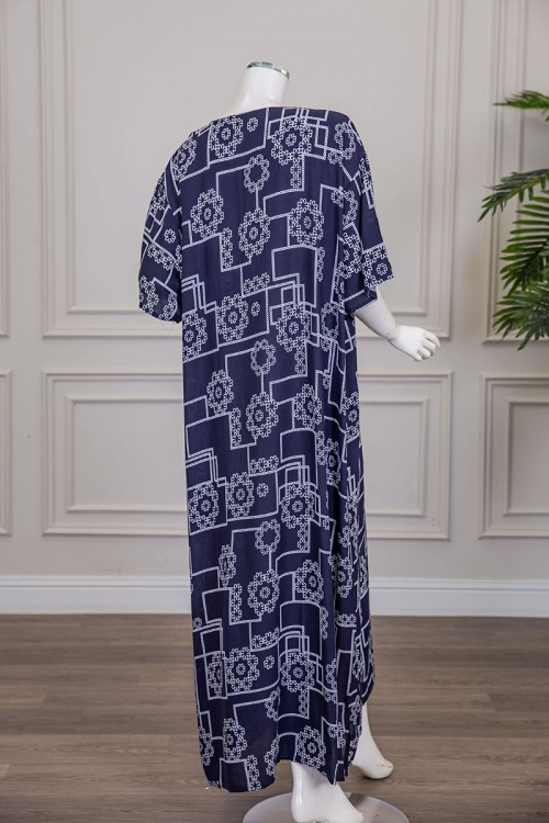 قميص نسائي طويل لون كحلي مزين برسومات و أشكال هندسية ياقة دائرية بأزرار من الأمام و أكمام قصيرة